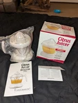 Continental Electric 24 Oz Citrus Juicer - White, Open Box Unused. Fixed Price $24.95.