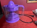 Intertek Mcm Electric Citrus Juicer, Purple Model # K41601.. Fixed Price $25.50.