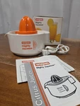 Vintage Waring Mighty Squeeze Electric Citrus Juicer Orange & White JC210-1. Fixed Price $24.99.
