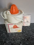 Vintage Waring Mighty Squeeze Electric Citrus Juicer Orange & White JC210-1 New. Fixed Price $42.27.
