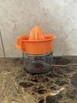 Arrow Home Products 12 Oz Citrus Juicer Manual Orange Plastic Glass Bottom Clear. Fixed Price $7.99.