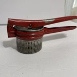 Antique Hand-held Potato Ricer Manual Press Metal Red Handle Works Great. Fixed Price $17.99.