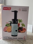 Dash Deluxe Compact Cold Press Masticating Power Juicer Aqua. Fixed Price $73.42.
