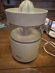 Vintage Oster Citrus Juicer 4100-08A White. Fixed Price $20.01.