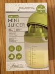 Dual Press Mini Juicer Real Simple 300ML, New. Fixed Price $12.88.