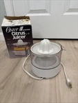 Vtg Oster Automatic Electric Citrus Juicer 20-OZ Model 4140-08 Health Natural. Fixed Price $27.99.