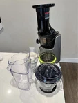 Kuvings Whole Slow Juicer Grey, Includes Sorbet Strainer. Fixed Price $300.00.