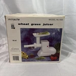 Miracle Slow Juicer In Box W/ Attachments MJ-550. Fixed Price $49.00.