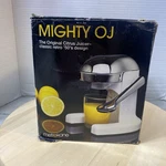 Metrokane Mighty Oj- The Original Juicer- Classic 1990 Design Chrome Red. Fixed Price $44.99.