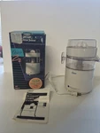 Oster Designer Automatic Citrus Juicer 1992 3182 4100-20 New Open Box. Fixed Price $22.49.