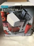 Hometrends Juice Extractor. Fixed Price $20.00.