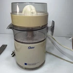 Vintage Oster Automatic Electric Designer Citrus Juicer Model 4100-20A. Fixed Price $23.45.