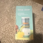Automatic Citrus Juicer Usb Charging Design Easy Clean White Green Base Cup Lid. Fixed Price $19.99.