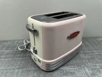 Nostalgia Retro Series 2-SLICE Toaster Pink With Crumb Tray, Cord Storage. Fixed Price $35.00.