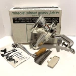 Vtg Miracle Wheatgrass Juicer MJ400 Cast Iron Tin Plated Hand Crank Original Box. Fixed Price $44.95.