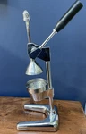 Metrokane Chrome-plated Lever-arm Manual Citrus Juicer. Fixed Price $39.95.