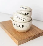 Ceramic Script Measuring Cups Once Upon Book Club New Opened Box. Fixed Price $22.95.