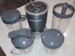Nutribullet NB-101B Personal Blender 600W Base W/cups Lids Blade Accessories. Fixed Price $49.99.